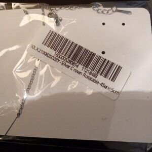 Brand new cross necklace with a crown on it. Three colors to choose from.